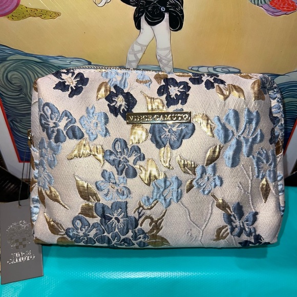 Vince Camuto Handbags - Vince Camuto Blue and Gold Cosmetic Bag with Floral Design